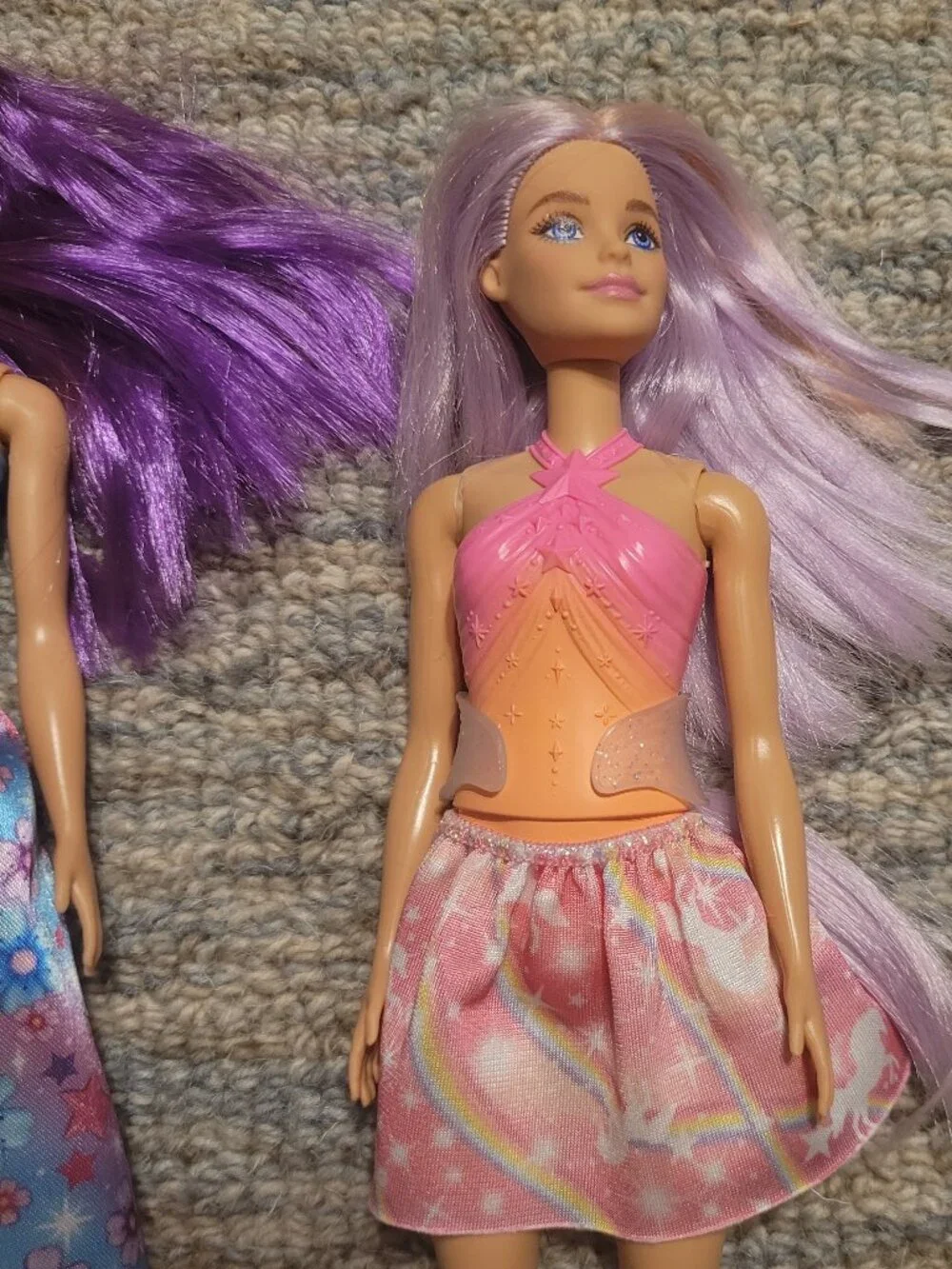 Four Barbie Dolls